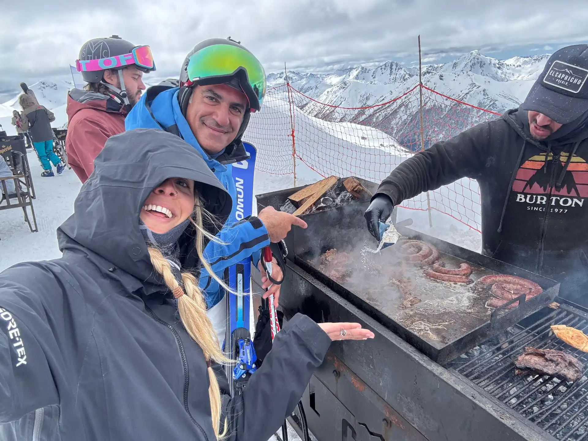 On-mountain asado grill with chorizo and beef at the summit of Cerro Bayo ski resort